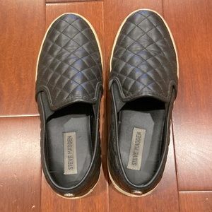 Steve Madden black quilted slip-ons- size 7